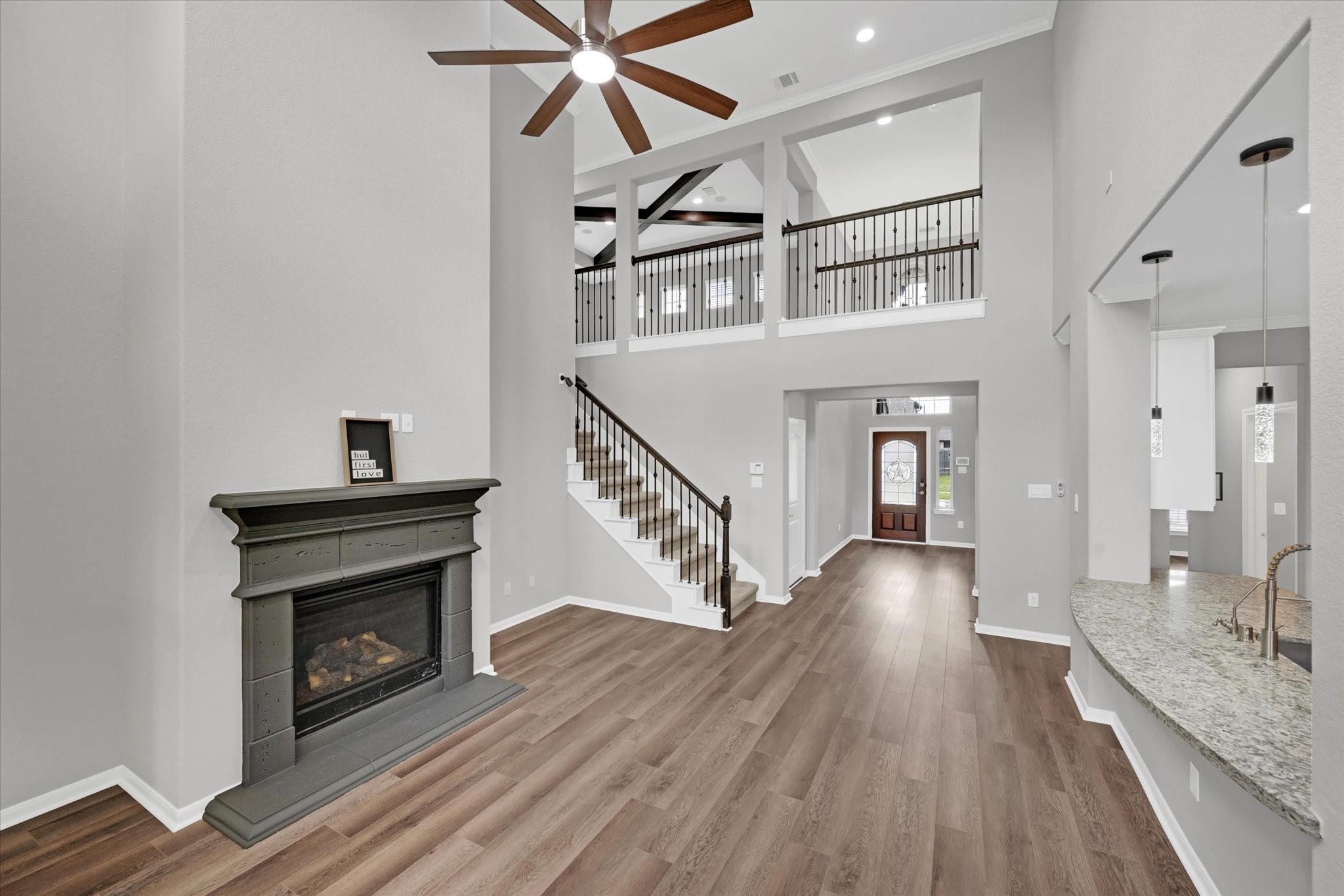 3834 Supremes Trail Spring, TX 77386 - Photo 11 of 36 Family room open to chef's kitchen with stainless steel appliances.