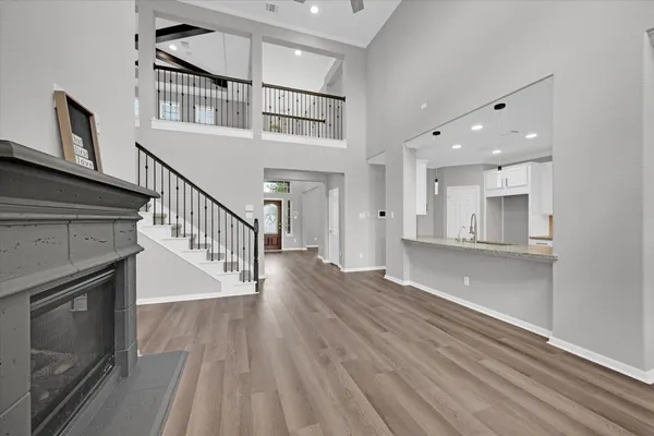 a view of a hallway with windows