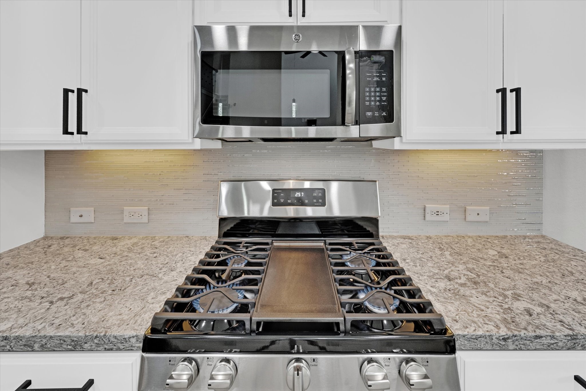 3834 Supremes Trail Spring, TX 77386 - Photo 17 of 36 a kitchen with granite countertop a stove and a sink