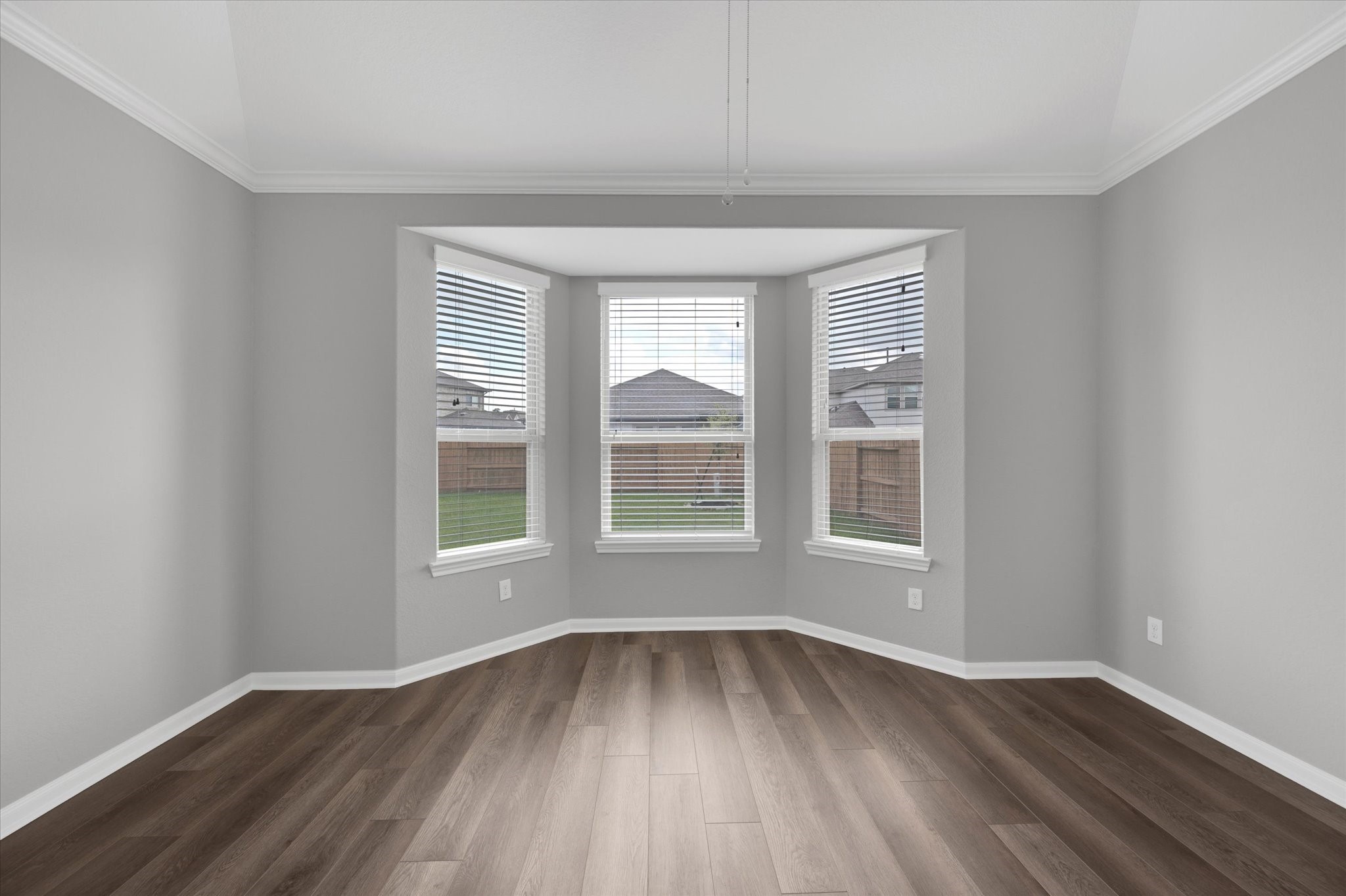 3834 Supremes Trail Spring, TX 77386 - Photo 20 of 36 an empty room with wooden floor and windows