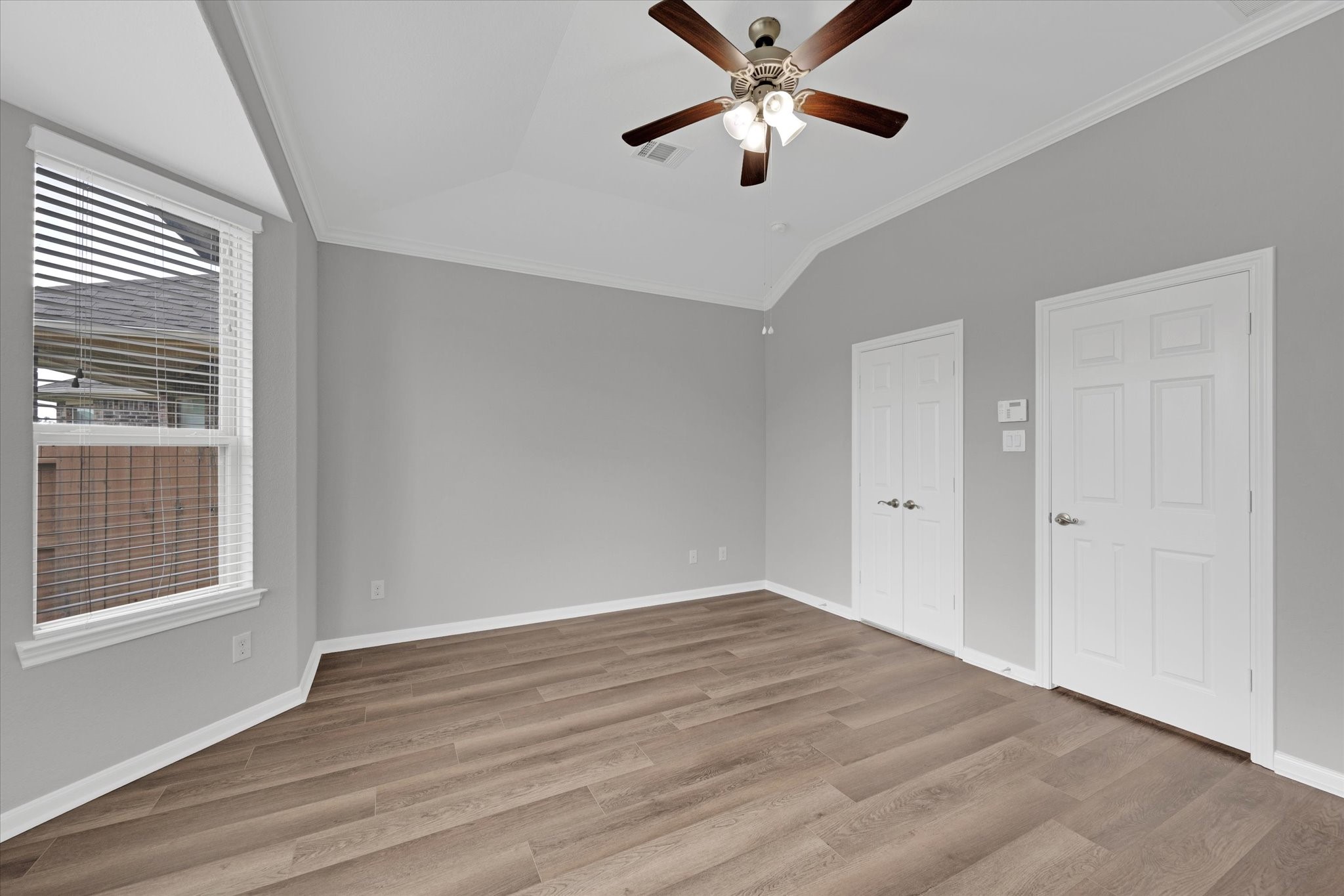 3834 Supremes Trail Spring, TX 77386 - Photo 21 of 36 wooden floor in an empty room with a window