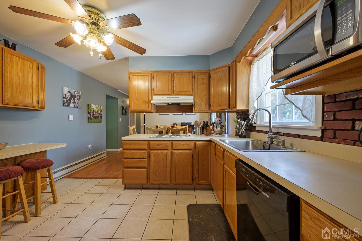 13 Fresh Ponds Road Monroe Township, NJ 08831 - Photo 7 of 20 Country Kitchen overlooking dining room.