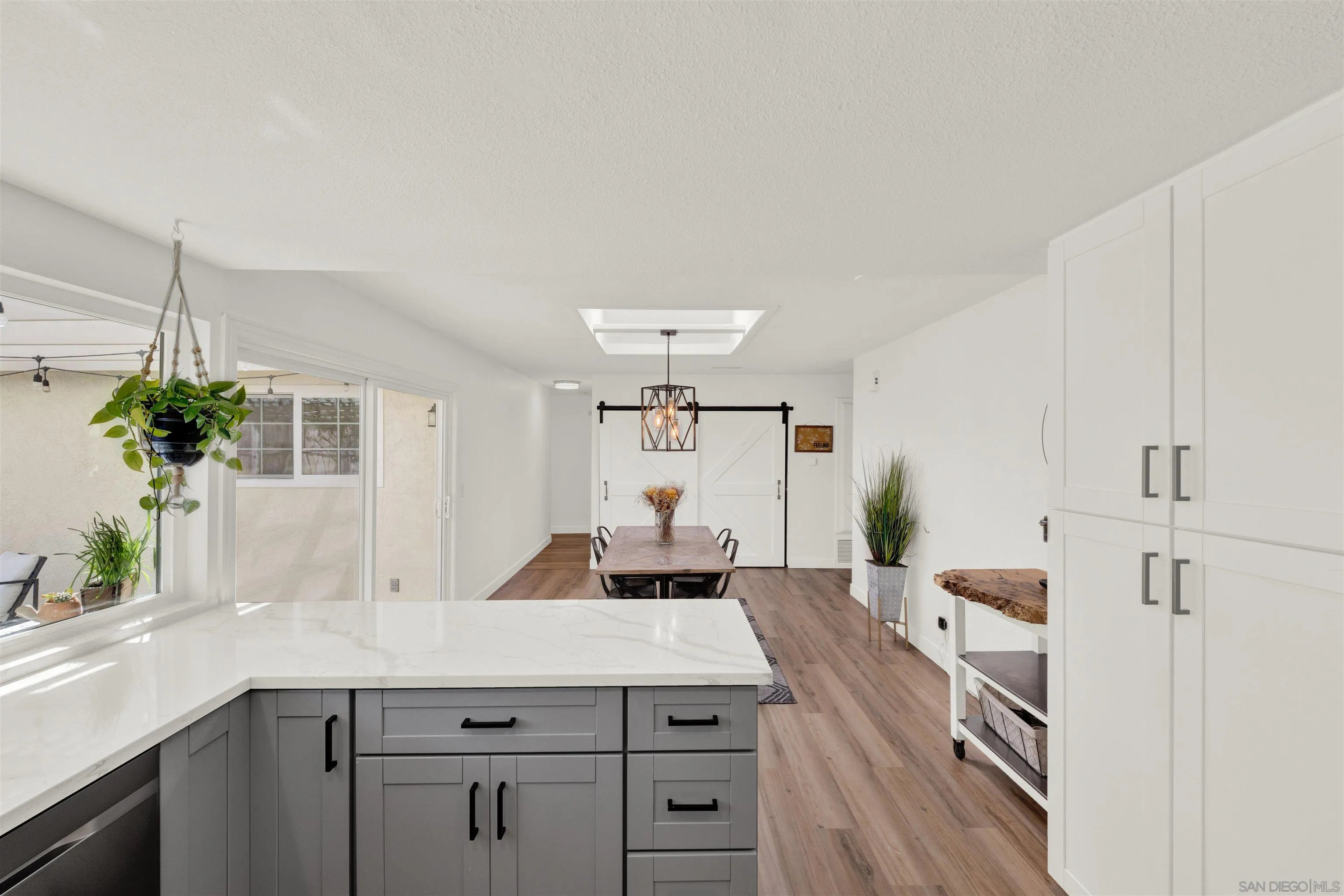 12435 Old Pomerado Road Poway, CA 92064 - Photo 20 of 53 a kitchen with a sink stove and refrigerator