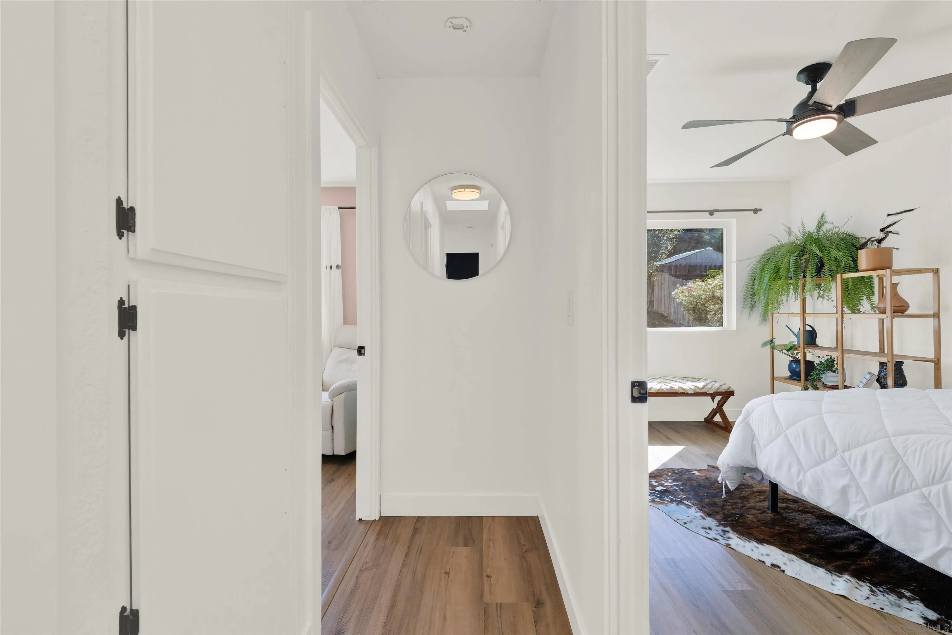 12435 Old Pomerado Road Poway, CA 92064 - Photo 35 of 53 a living room with a bed furniture and a window