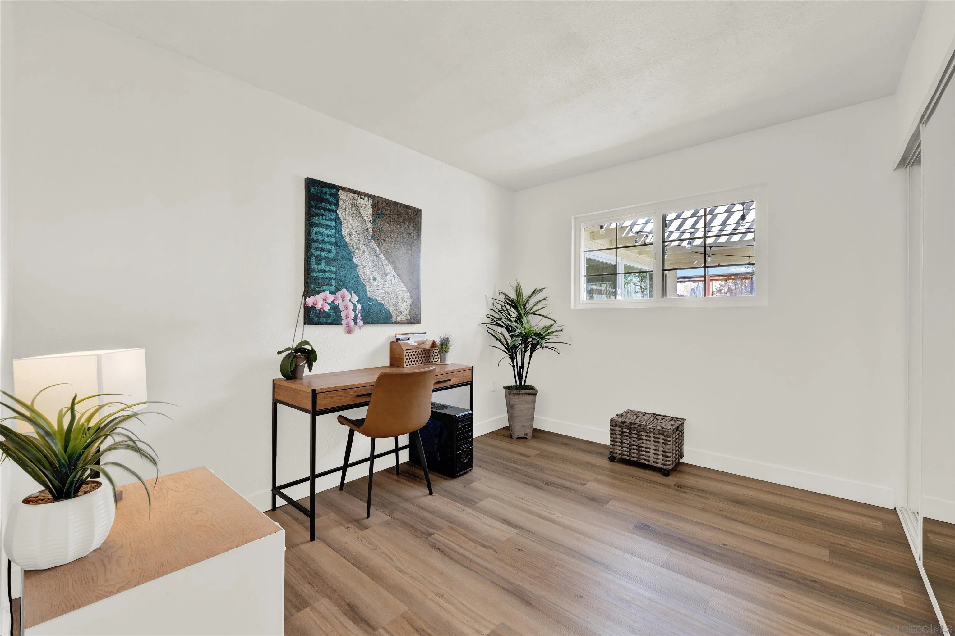 12435 Old Pomerado Road Poway, CA 92064 - Photo 43 of 53 a workspace with furniture and a potted plant