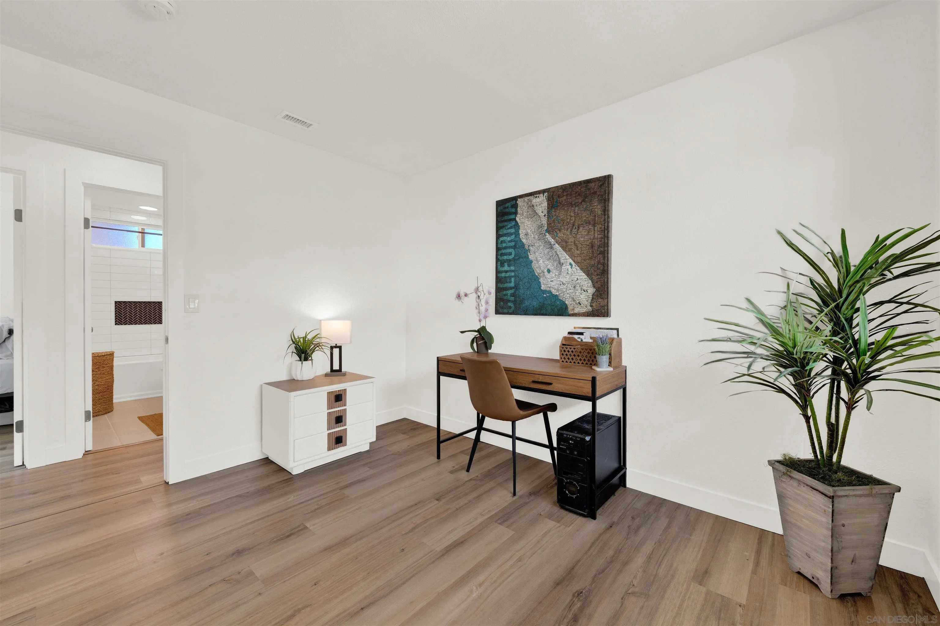 12435 Old Pomerado Road Poway, CA 92064 - Photo 44 of 53 a living room with furniture and a potted plant