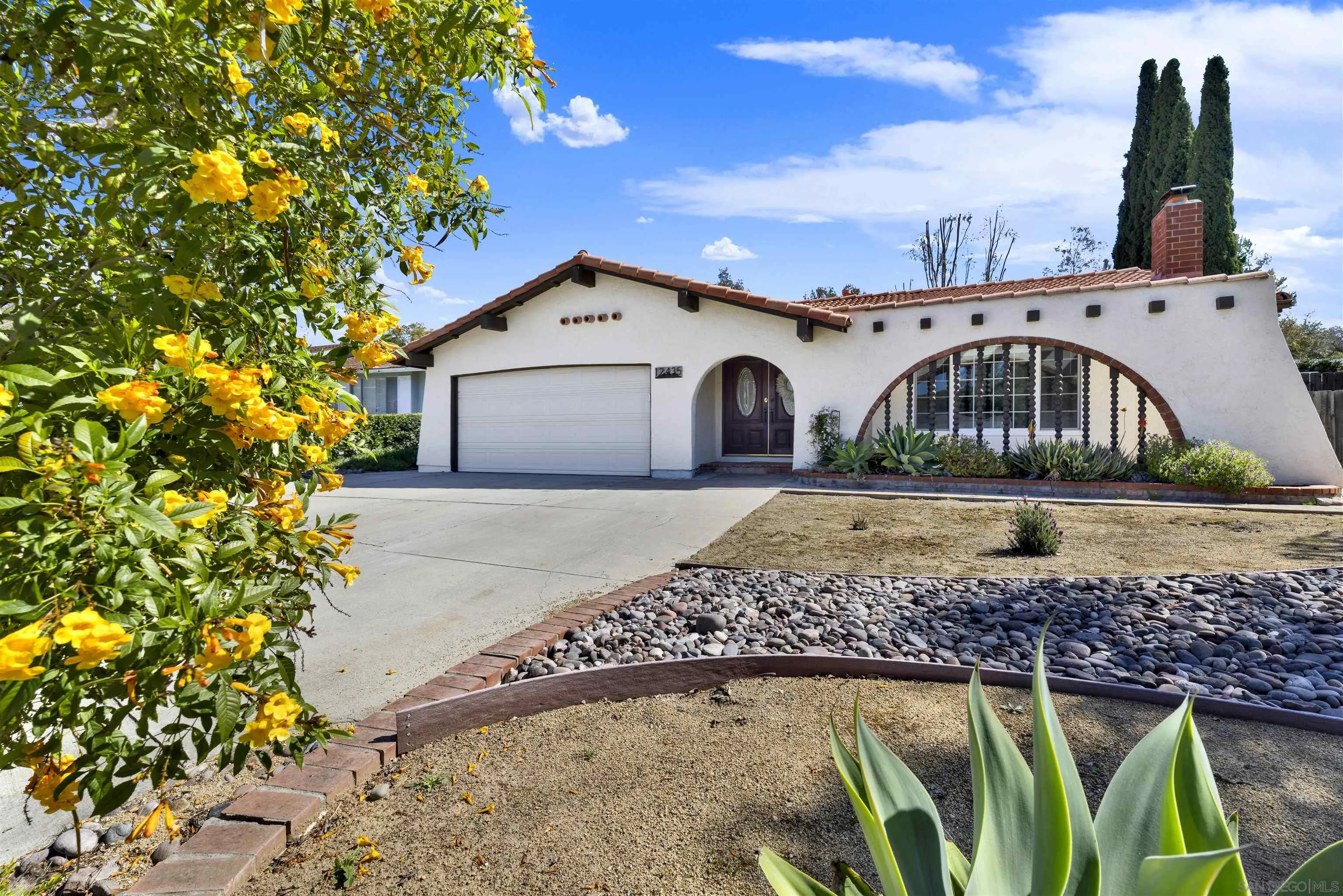 12435 Old Pomerado Road Poway, CA 92064 - Photo 50 of 53 a front view of a house with garden