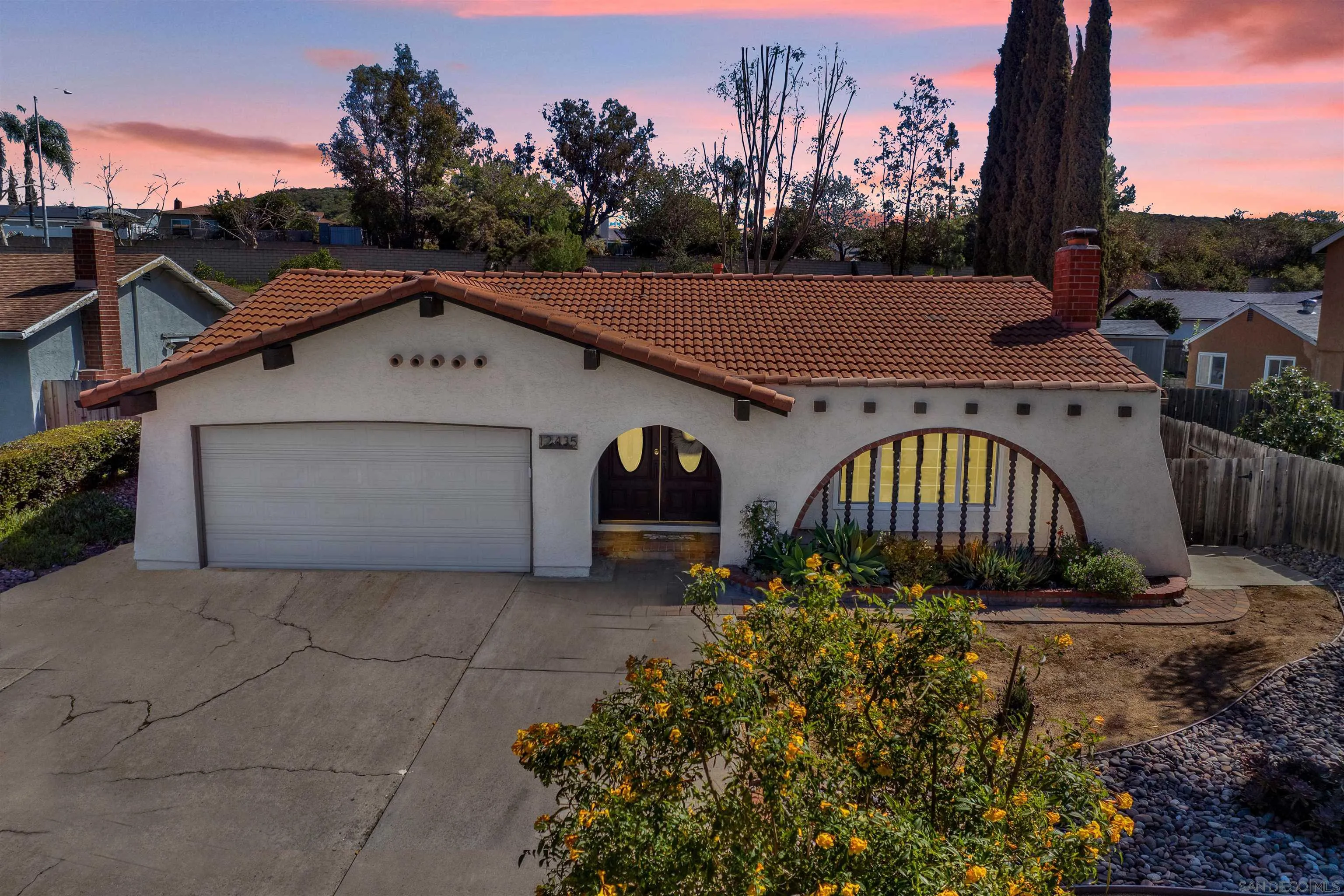 12435 Old Pomerado Road Poway, CA 92064 - Photo 6 of 53 a view of a house with a yard and a garden