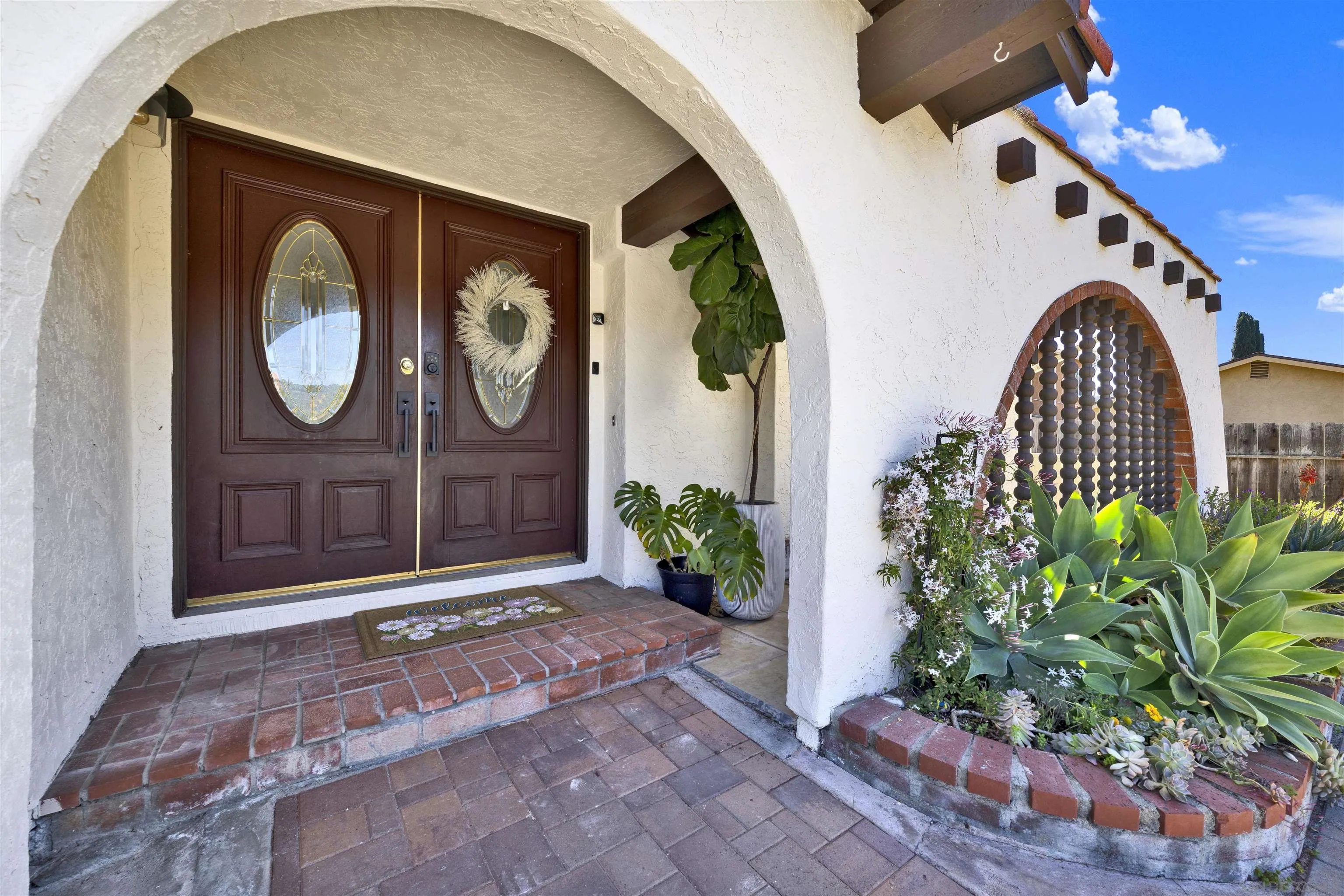 12435 Old Pomerado Road Poway, CA 92064 - Photo 7 of 53 a front view of a house with garden