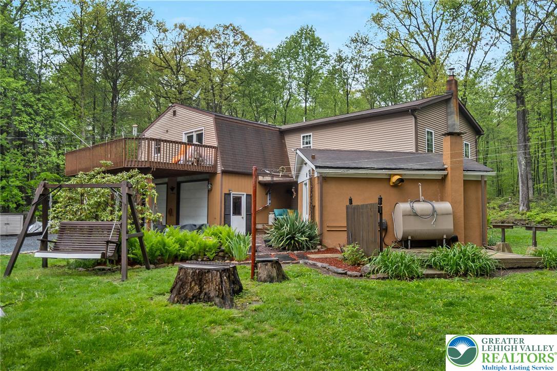 9223 North Loop Road Slatington, PA 18080 - Photo 5 of 60 a front view of house with a garden