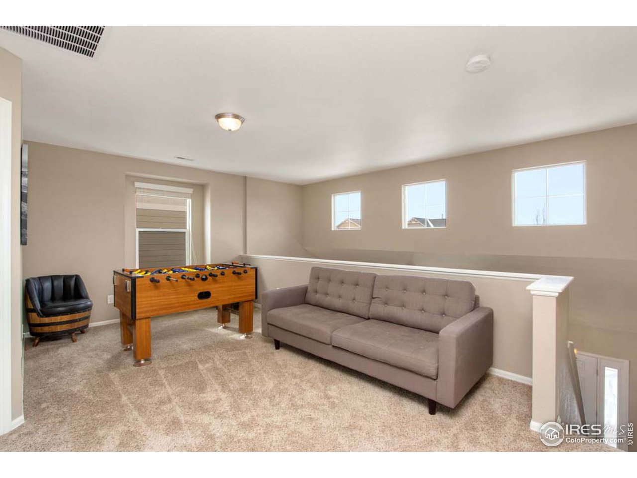 938 Trading Post Road Fort Collins, CO 80524 - Photo 13 of 26 Playroom Loft Area
