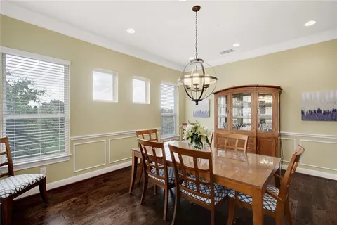 a spacious bedroom with a bed and a large window