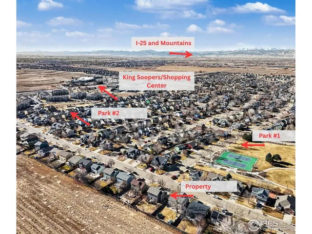 a picture of a lake with a city view