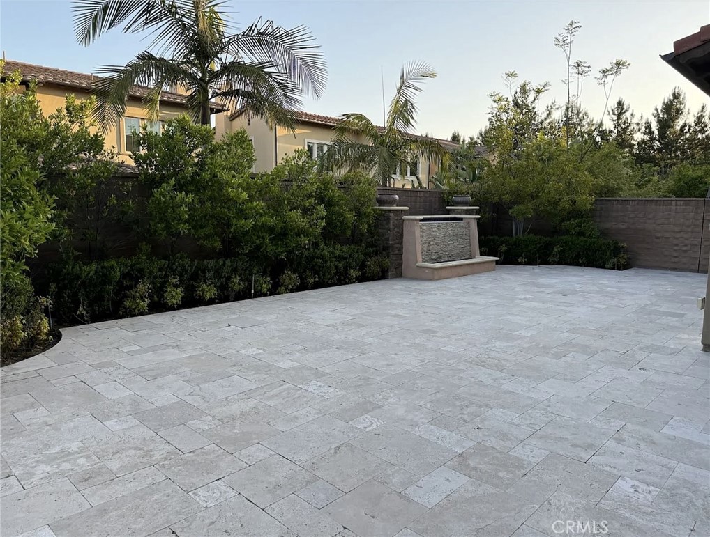 10 Hawkeye Irvine, CA 92602 - Photo 13 of 13 a view of a white house with a yard and large tree