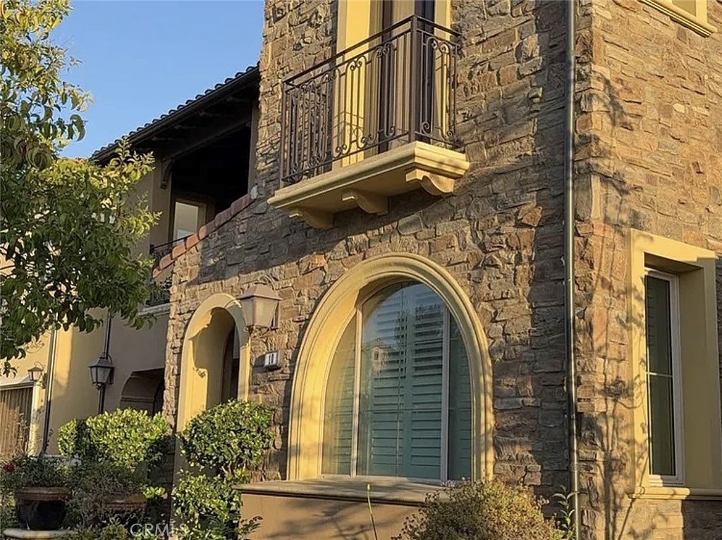 10 Hawkeye Irvine, CA 92602 - Photo 2 of 13 a view of a house with many windows