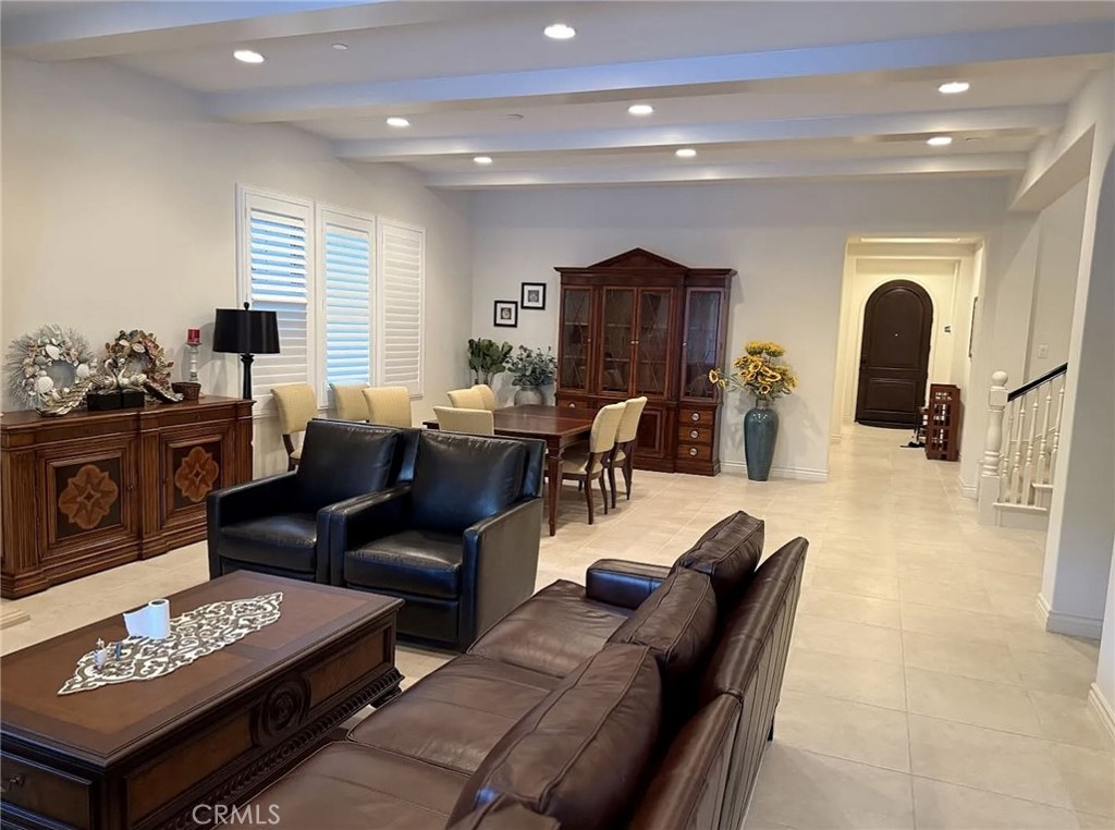 10 Hawkeye Irvine, CA 92602 - Photo 4 of 13 a living room with furniture and a fireplace