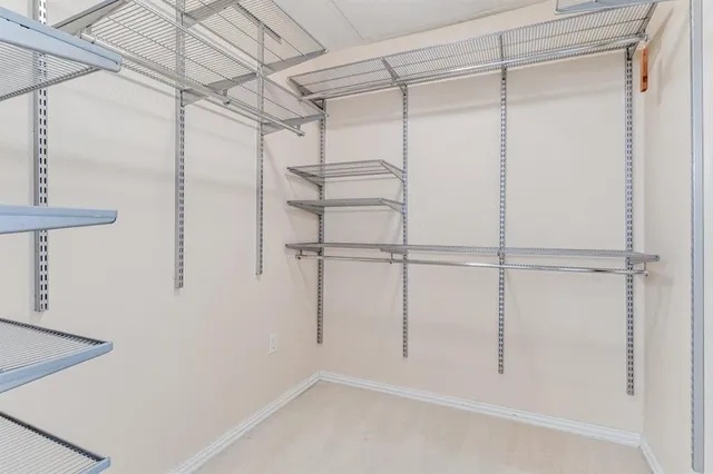 a view of a room with racks on the wall