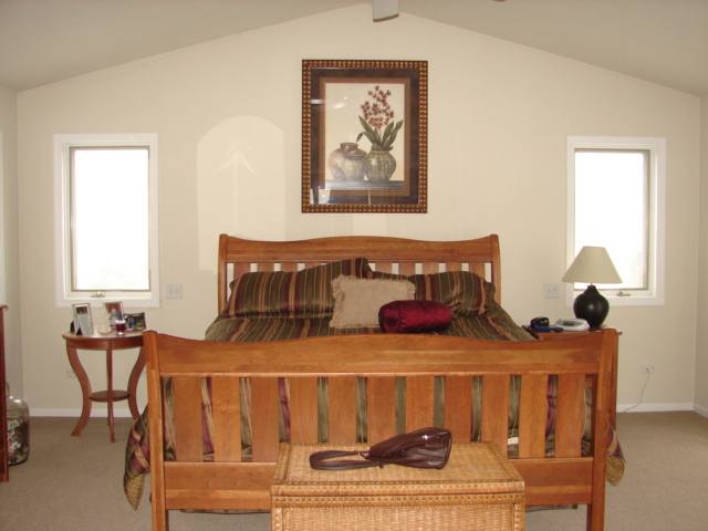 8475 West Mound Road Lena, IL 61048 - Photo 5 of 9 a bedroom with furniture and a window