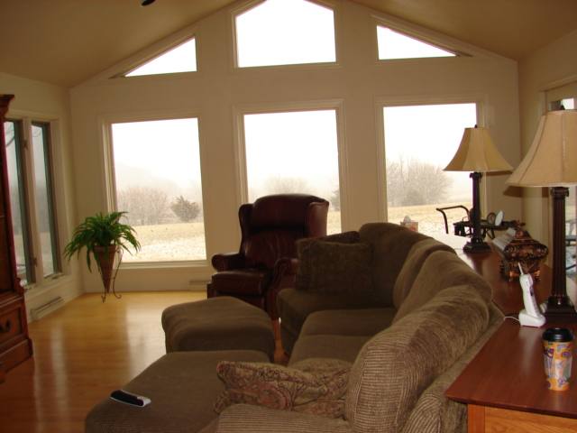 8475 West Mound Road Lena, IL 61048 - Photo 7 of 9 a living room with furniture and a large window