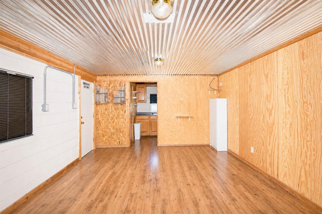 8228 Us Highway Rochelle, TX 76872 - Photo 36 of 36 a view of empty room with wooden floor and fan