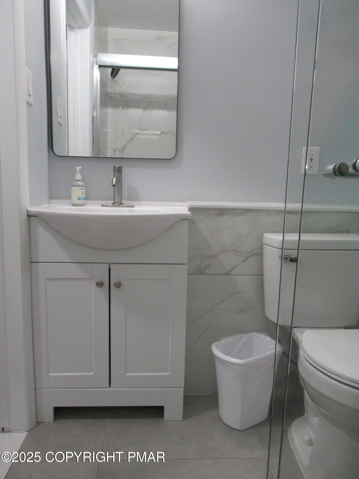 11 Maplewood Road Lake Harmony, PA 18624 - Photo 16 of 44 a bathroom with a sink a toilet and a mirror