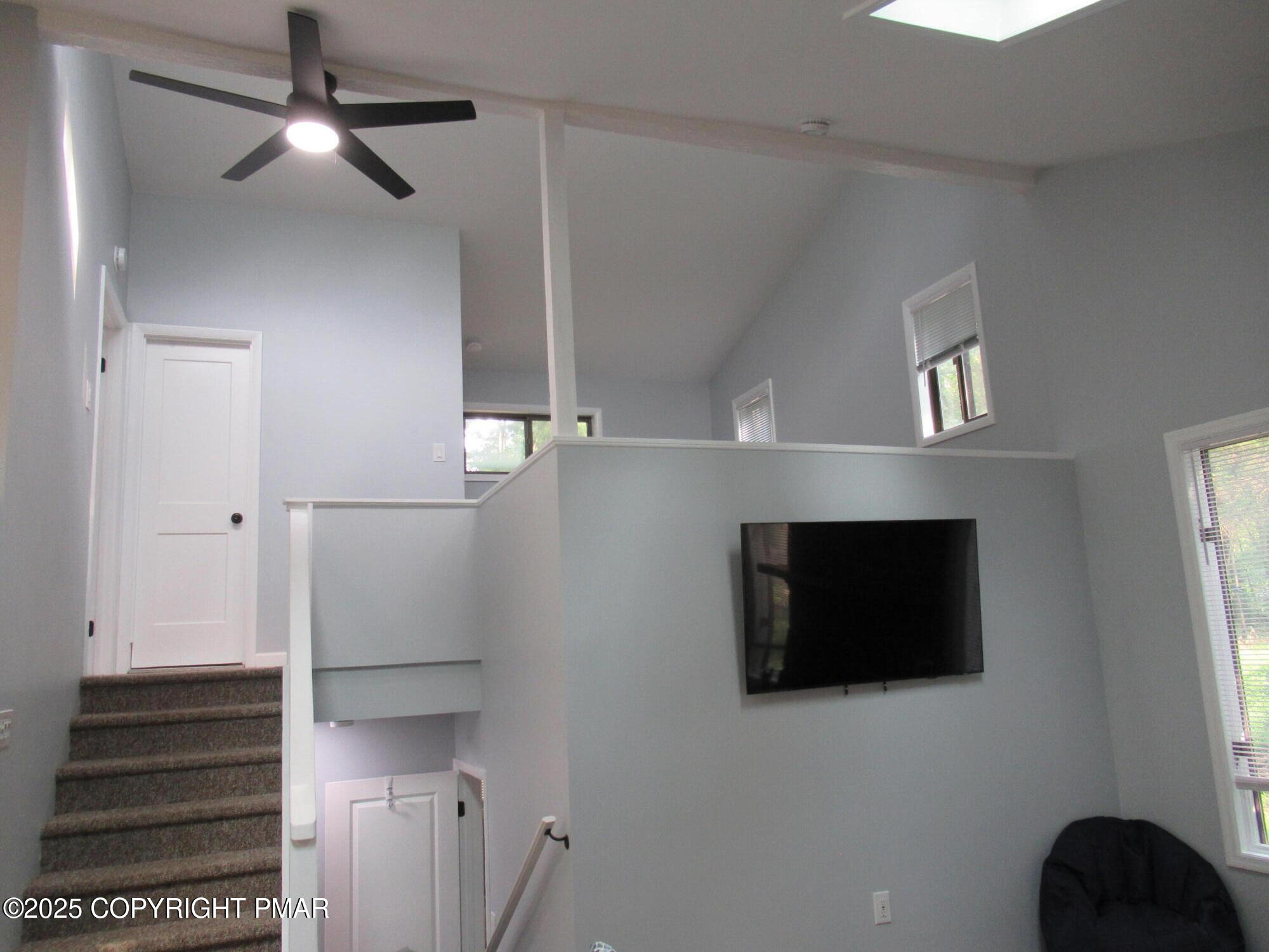 11 Maplewood Road Lake Harmony, PA 18624 - Photo 19 of 44 a view of a livingroom with an empty space and a fireplace
