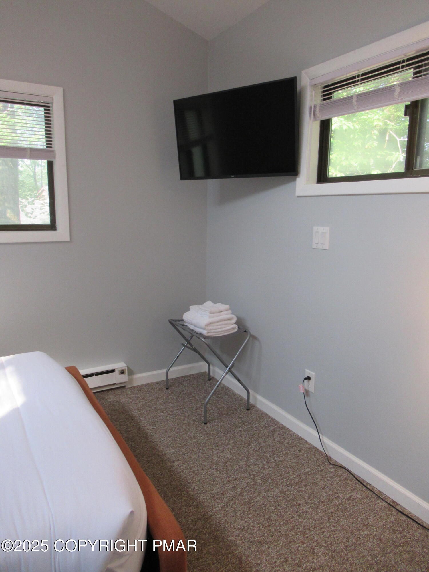 11 Maplewood Road Lake Harmony, PA 18624 - Photo 21 of 44 a bathroom with a toilet a sink and a mirror