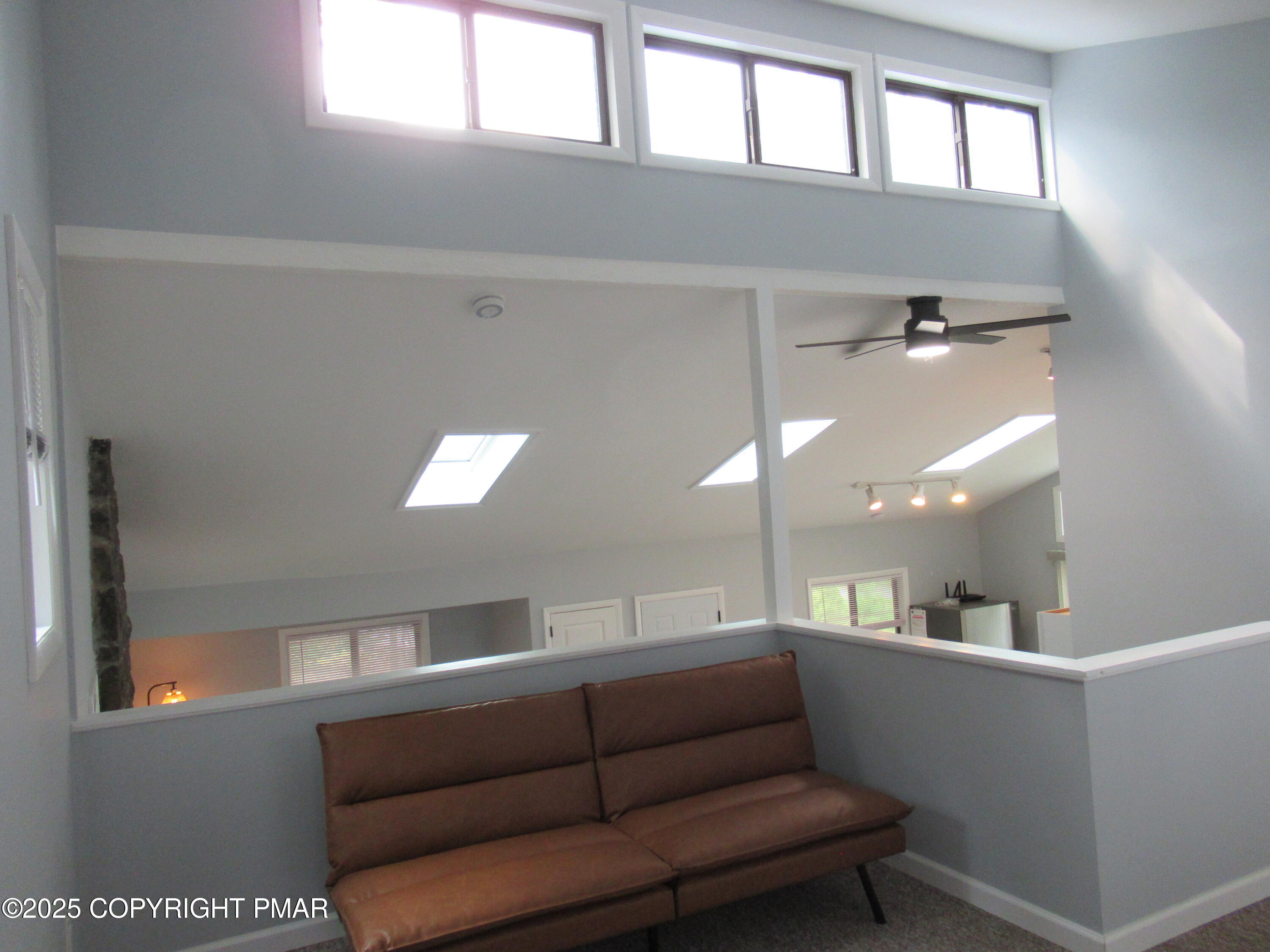 11 Maplewood Road Lake Harmony, PA 18624 - Photo 24 of 44 a living room with furniture and a window