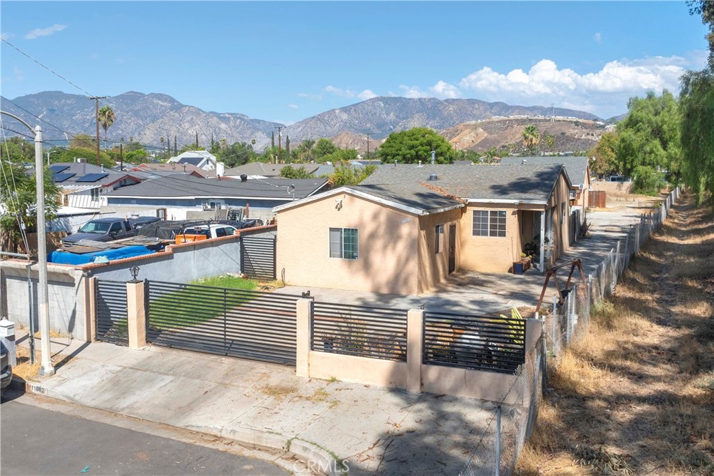 11602 Fellows Avenue Pacoima, CA 91331 - Photo 1 of 40 a view of a house with a outdoor space
