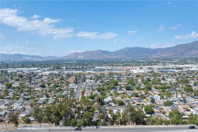 an aerial view of residential houses and outdoor space