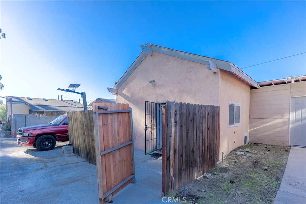 11602 Fellows Avenue Pacoima, CA 91331 - Photo 20 of 40 a view of a house with a yard
