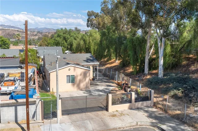 a view of a house with a park