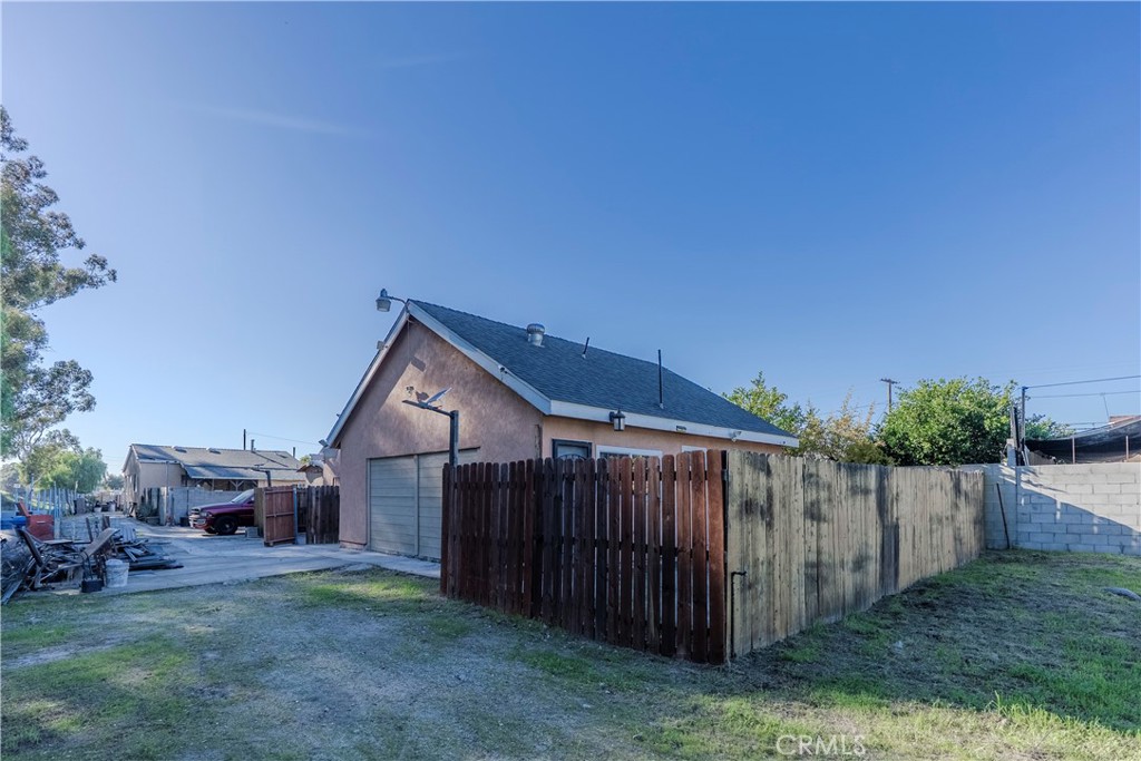 11602 Fellows Avenue Pacoima, CA 91331 - Photo 37 of 40 a wooden fence with a small yard