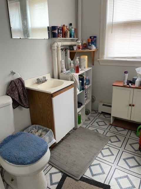 24 Lowell Street Wilmington, MA 01887 - Photo 16 of 26 a utility room with a washing machine