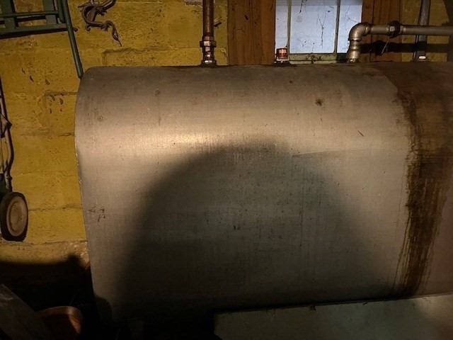 24 Lowell Street Wilmington, MA 01887 - Photo 20 of 26 a view of a room with wooden walls