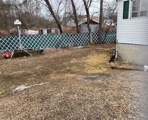 24 Lowell Street Wilmington, MA 01887 - Photo 24 of 26 a backyard of a house