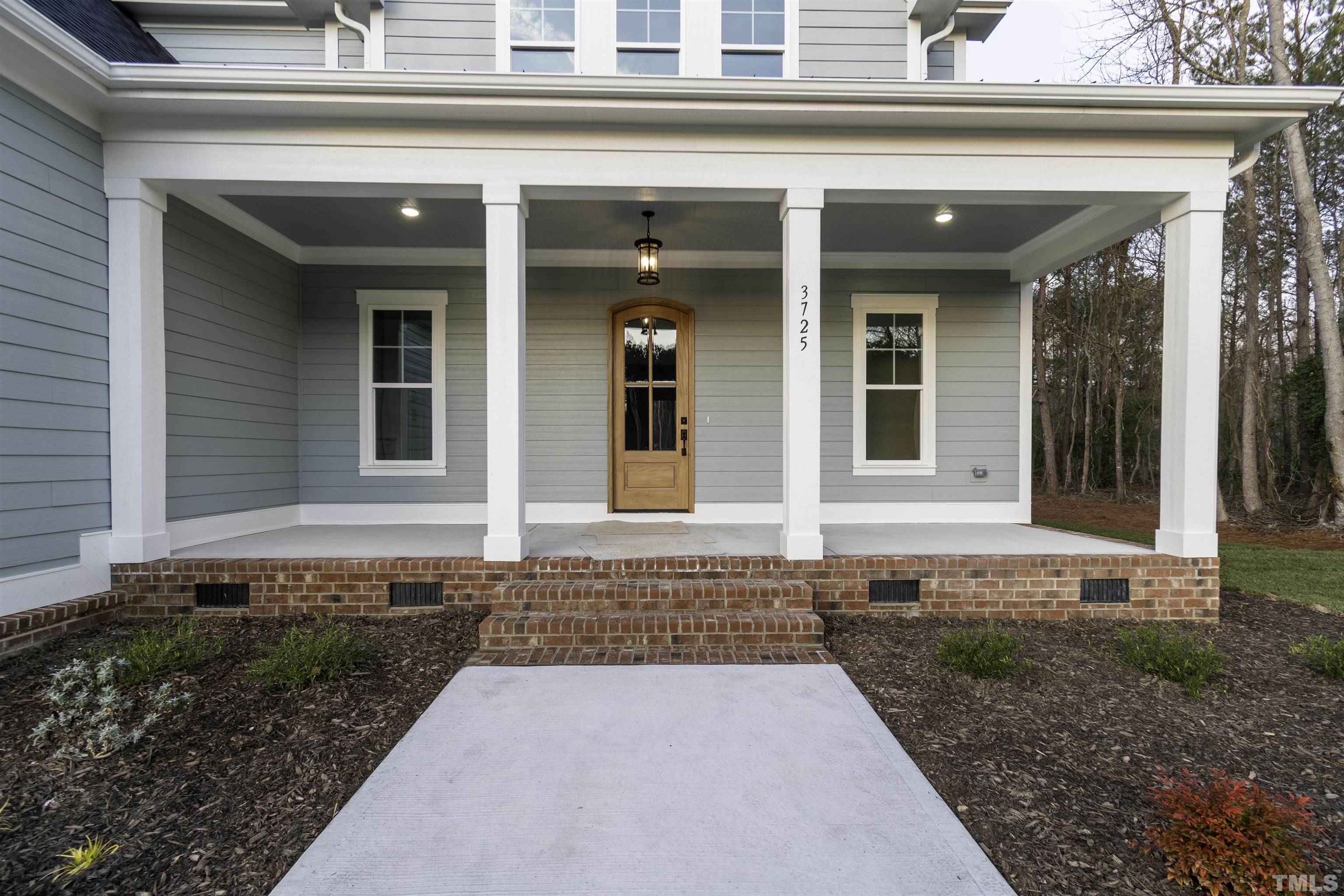 3725 Doyle Road Zebulon, NC 27597 - Photo 3 of 51 front view of a house