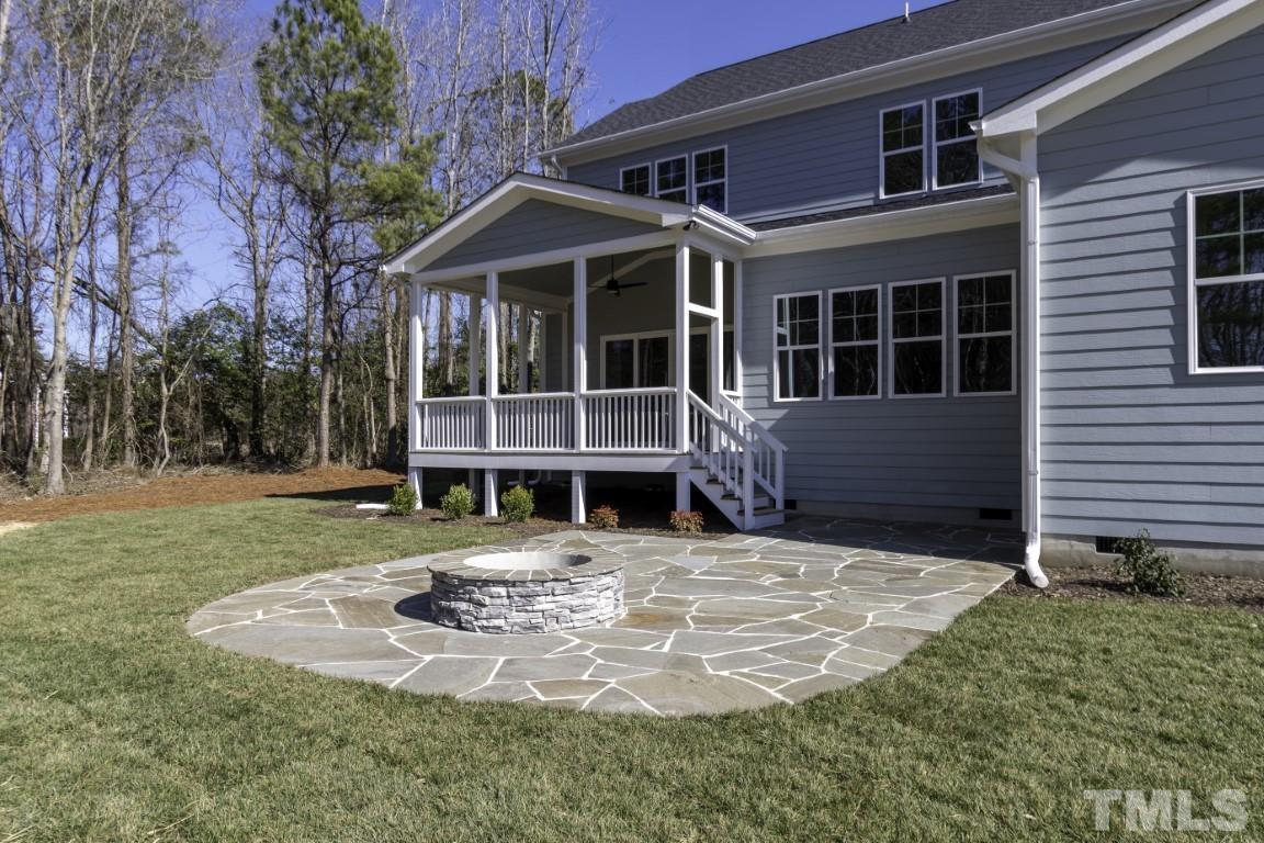 3725 Doyle Road Zebulon, NC 27597 - Photo 45 of 51 a view of a house with a yard