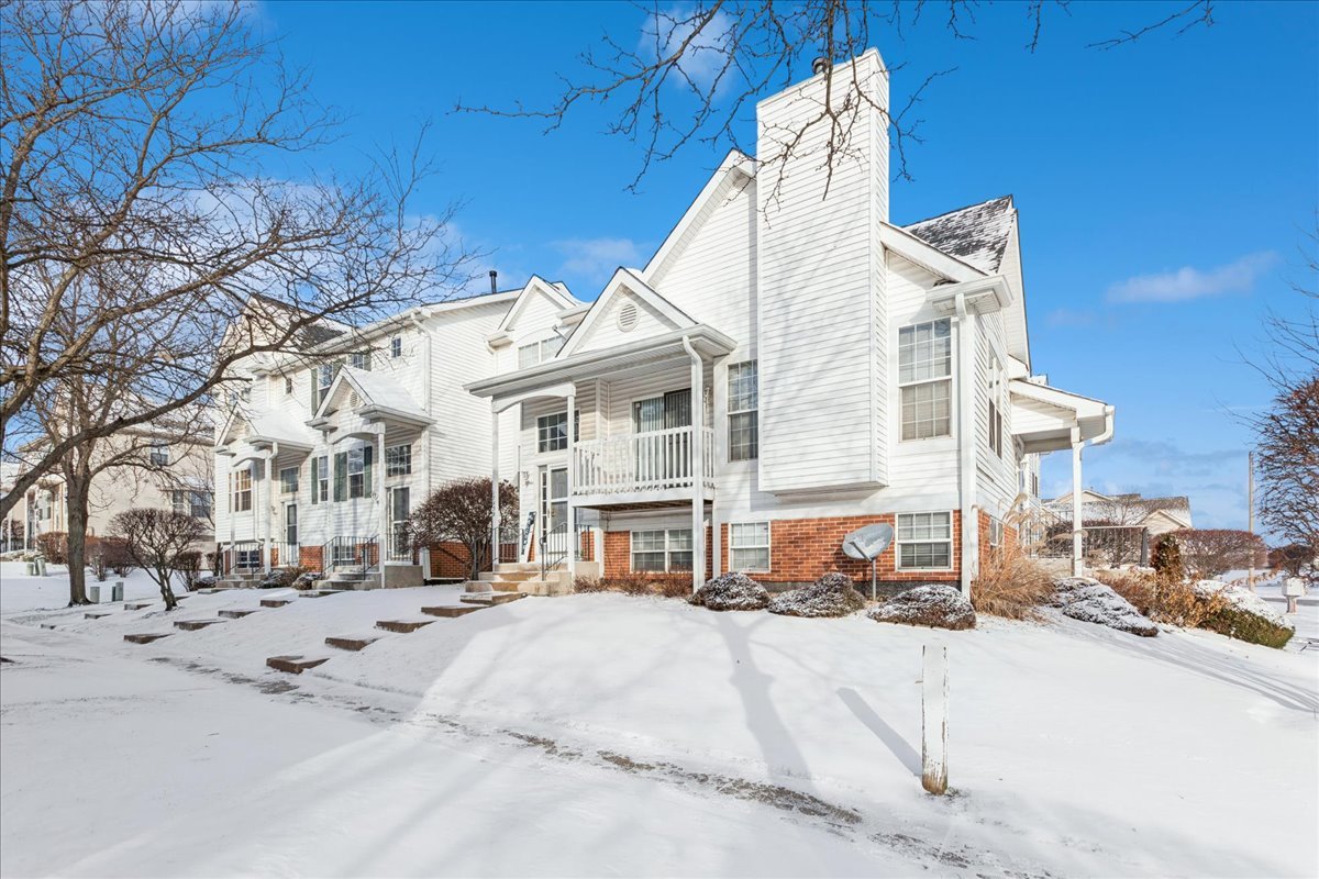 17440 Yakima Drive Lockport, IL 60441 - Photo 2 of 20 a view of a building with cars parked on the road