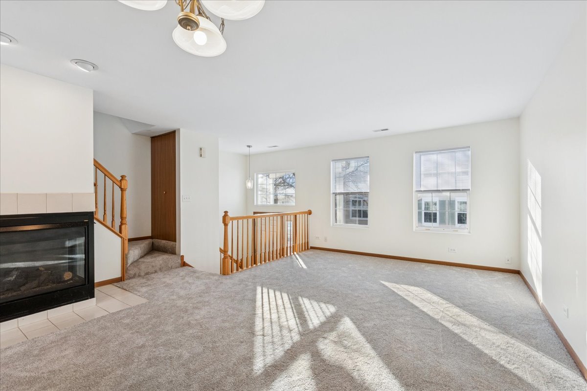 17440 Yakima Drive Lockport, IL 60441 - Photo 4 of 20 a view of livingroom with hardwood floor and kitchen view