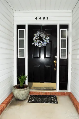 a view of a entryway of a house