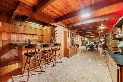 a view of a chairs and tables in patio