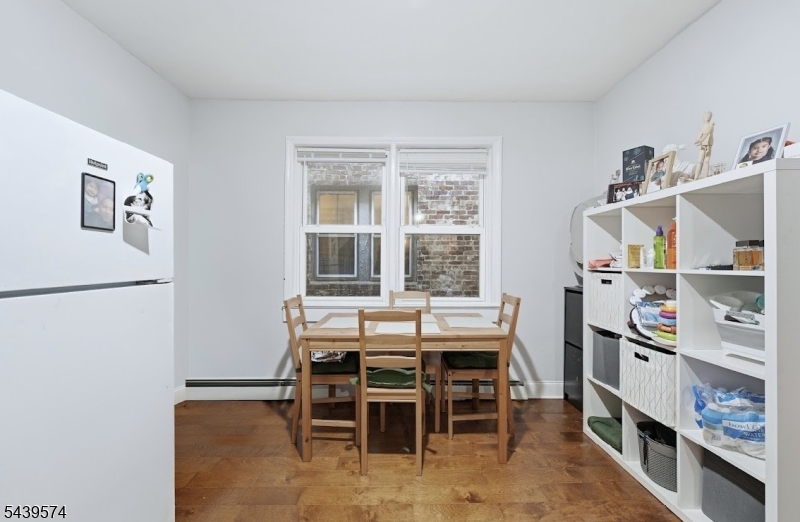 328 John Street Elizabeth, NJ 07202 - Photo 5 of 9 a dining room with furniture and window