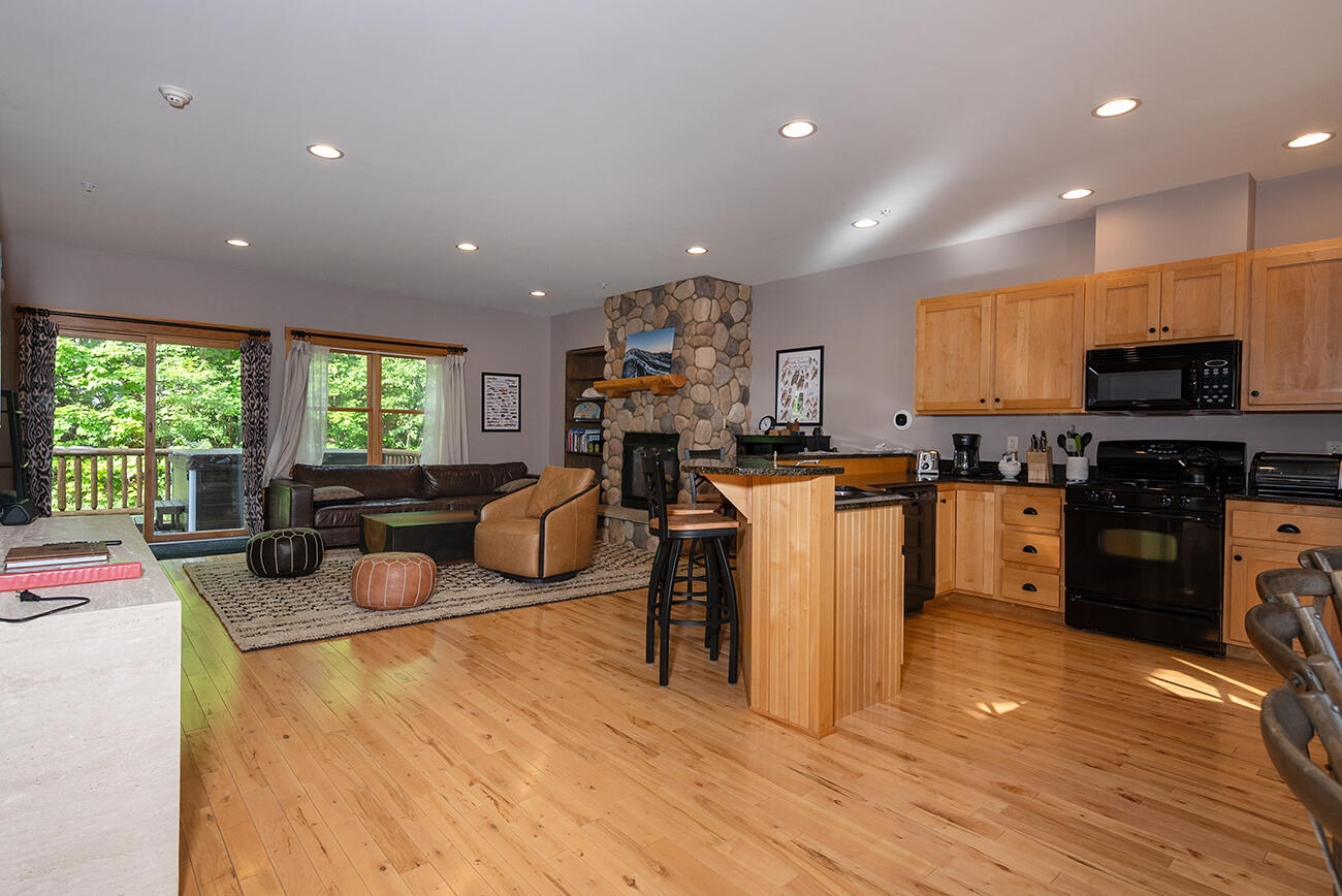7022 Hardwood Ridge Road, Unit 7022 Kingfield, ME 04947 - Photo 8 of 31 Kitchen & Living Room