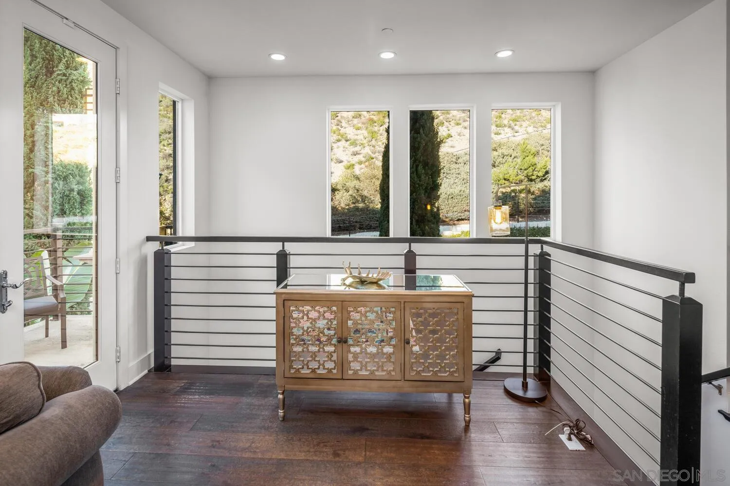 7845 Modern Oasis Drive San Diego, CA 92108 - Photo 12 of 39 a view of front door with furniture and a window