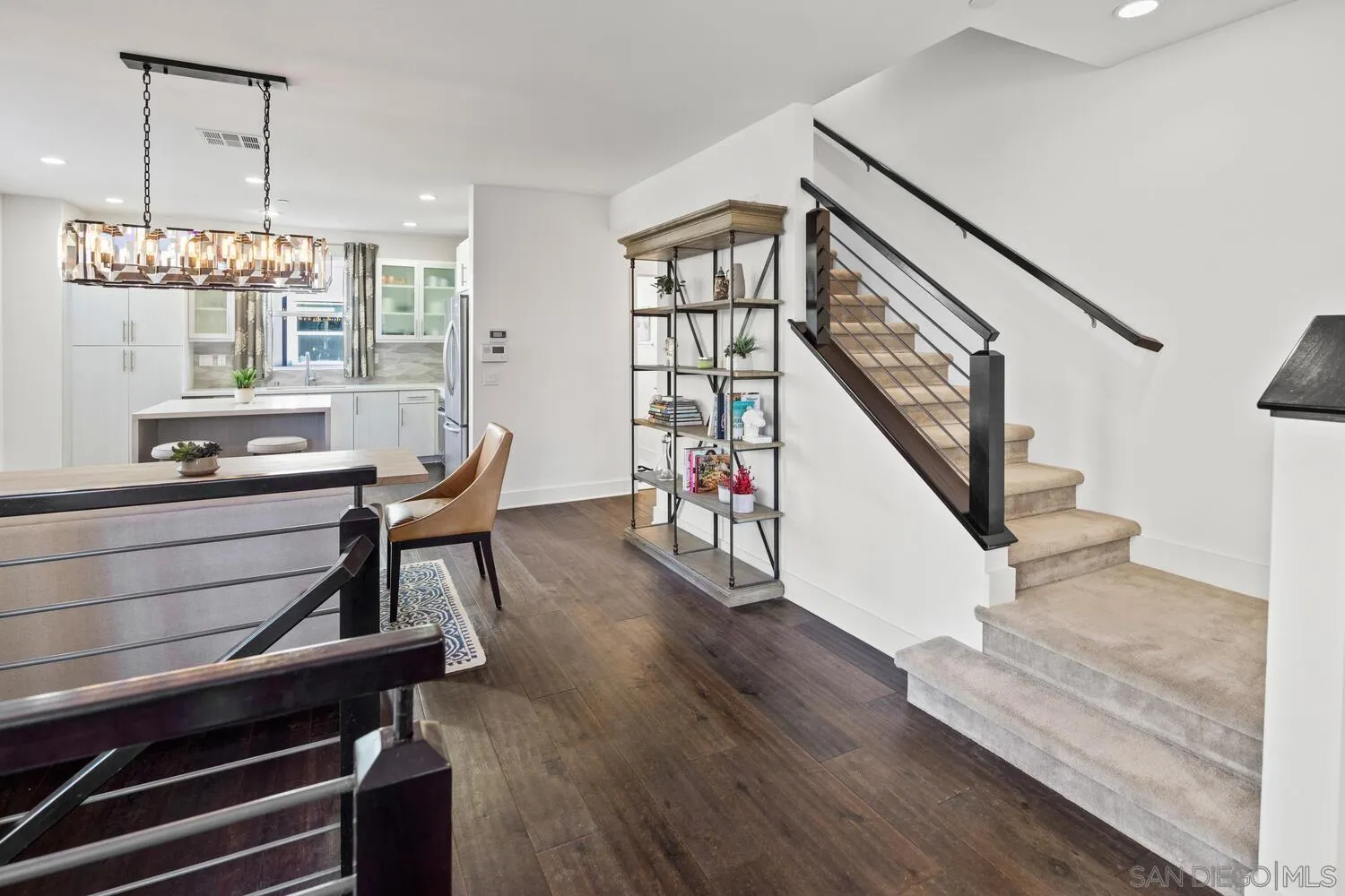7845 Modern Oasis Drive San Diego, CA 92108 - Photo 19 of 39 a living room with furniture and a wooden floor