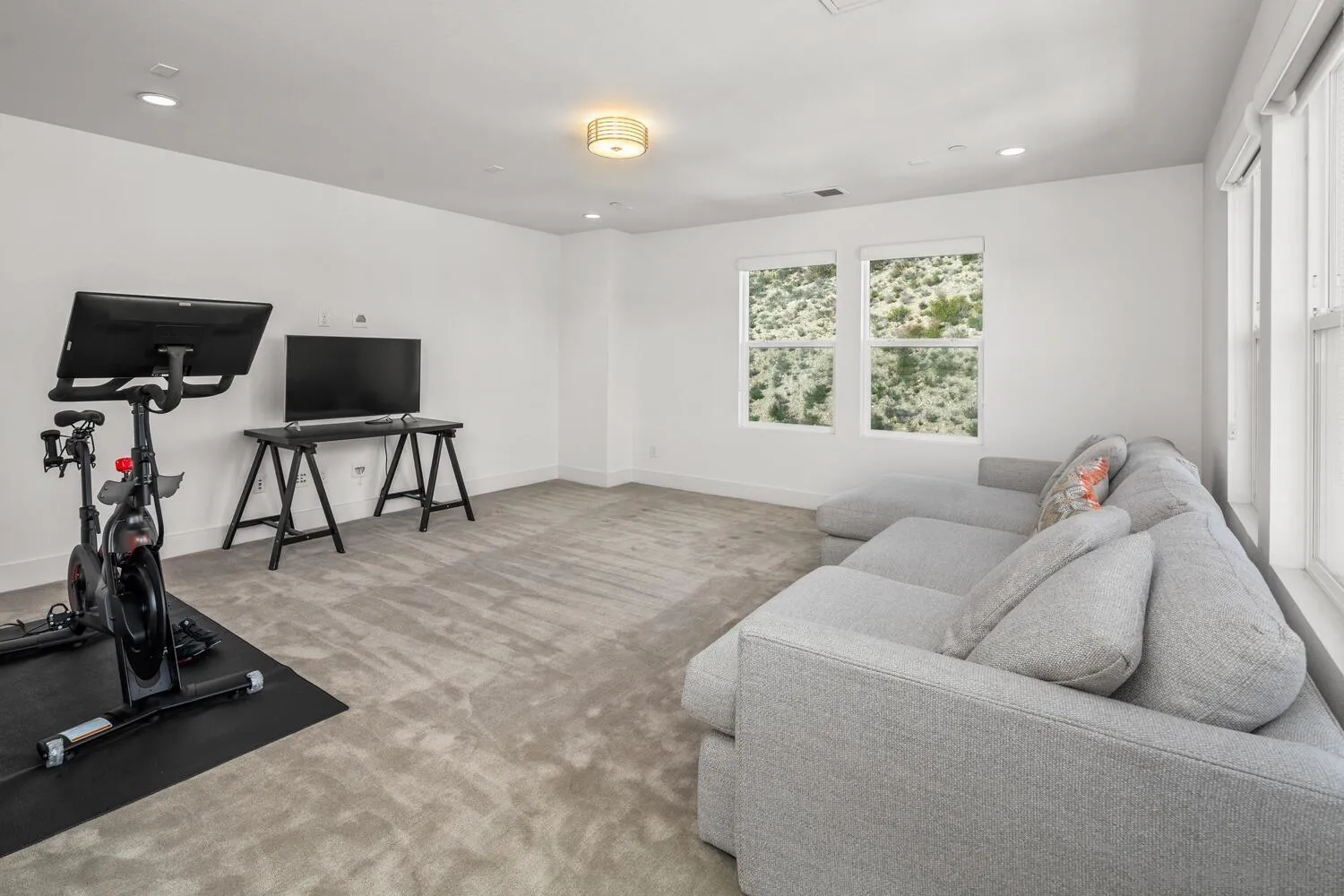7845 Modern Oasis Drive San Diego, CA 92108 - Photo 29 of 39 a living room with furniture and a flat screen tv