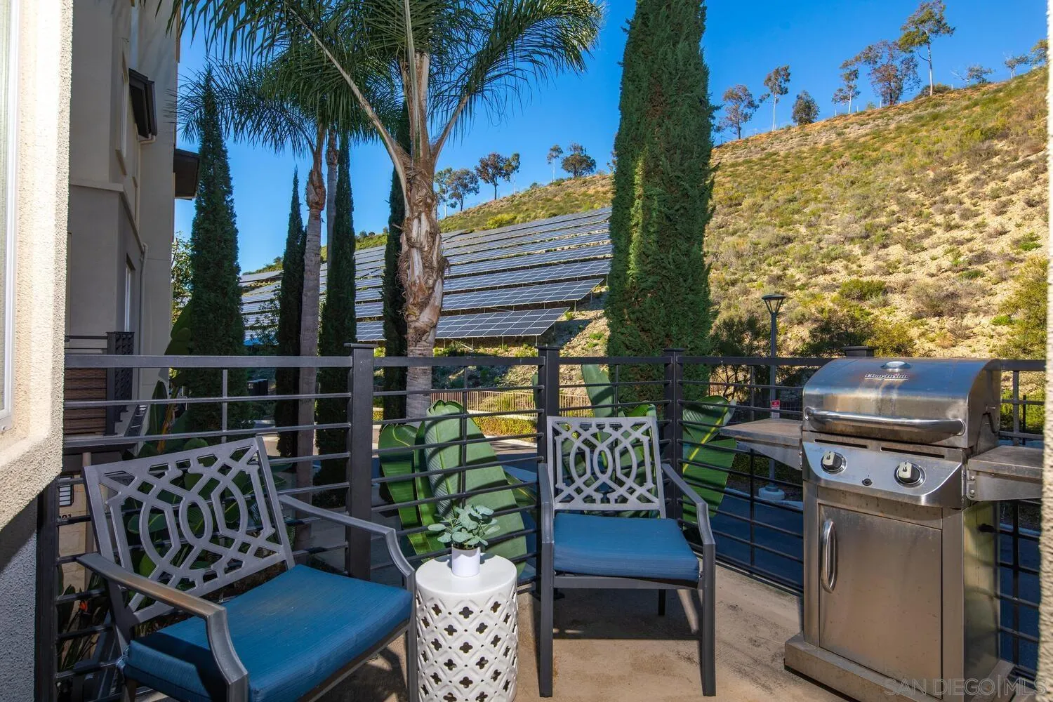 7845 Modern Oasis Drive San Diego, CA 92108 - Photo 31 of 39 a view of a chairs and table in the patio