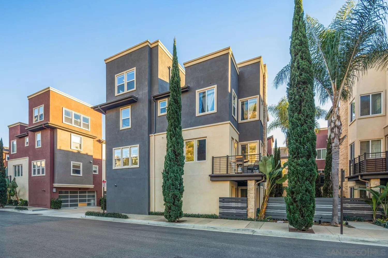 7845 Modern Oasis Drive San Diego, CA 92108 - Photo 4 of 39 a front view of a multi story building