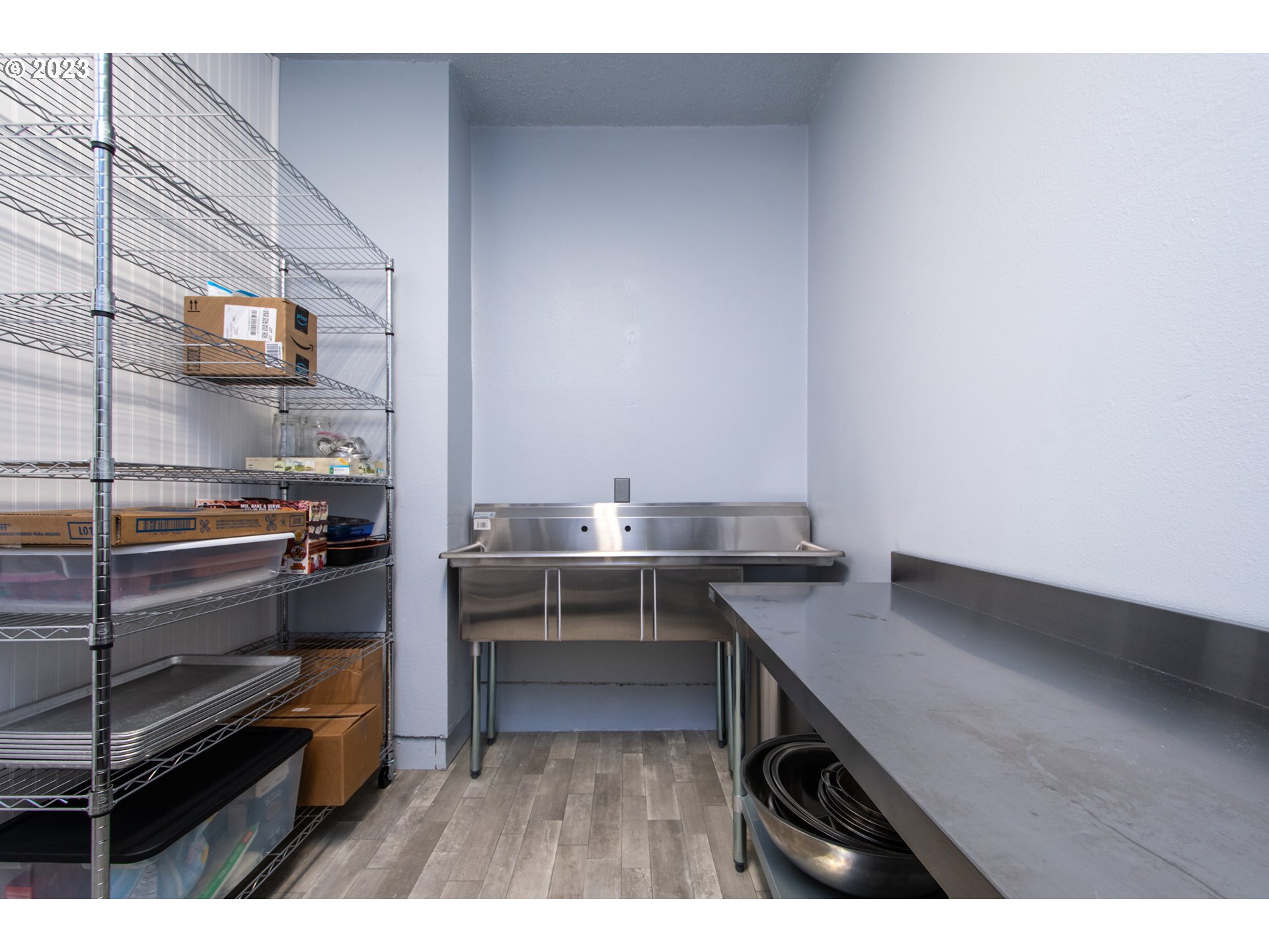30400 Northeast Healy Road Amboy, WA 98601 - Photo 20 of 48 a kitchen view with granite countertop a stove oven and a sink with wooden cabinet